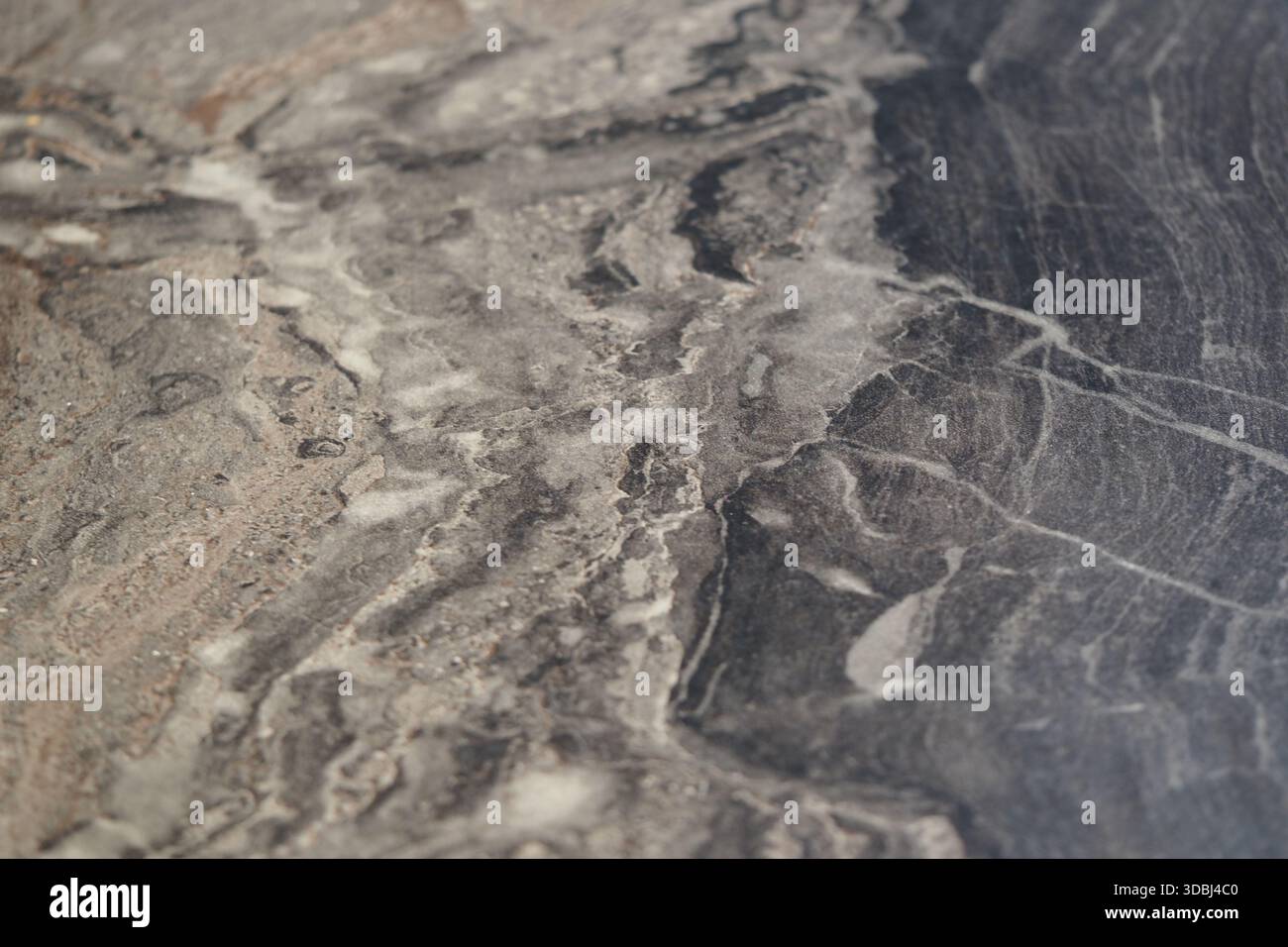 Natural stone surface with unique patterns and textures Stock Photo