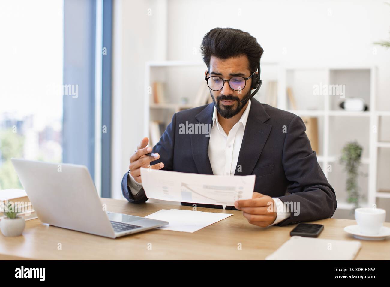 Indian Businessman Working Remotely Stock Photo