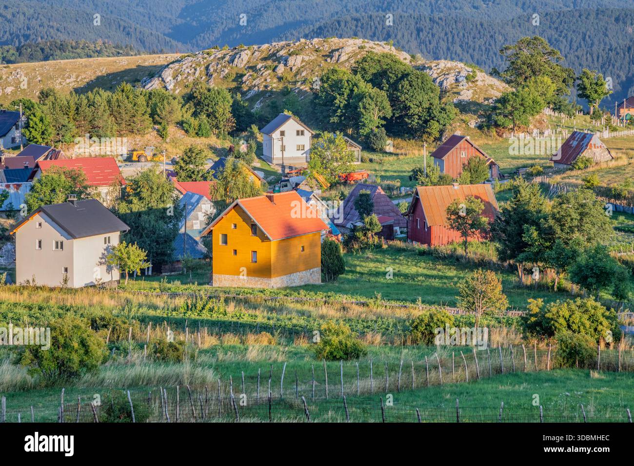 The traditional rural village of Brda on the slopes of Mount Bjelasnica, surrounded by hills and forests, Brda, Sarajevo Canton, Bosnia and Herzegovina Stock Photo