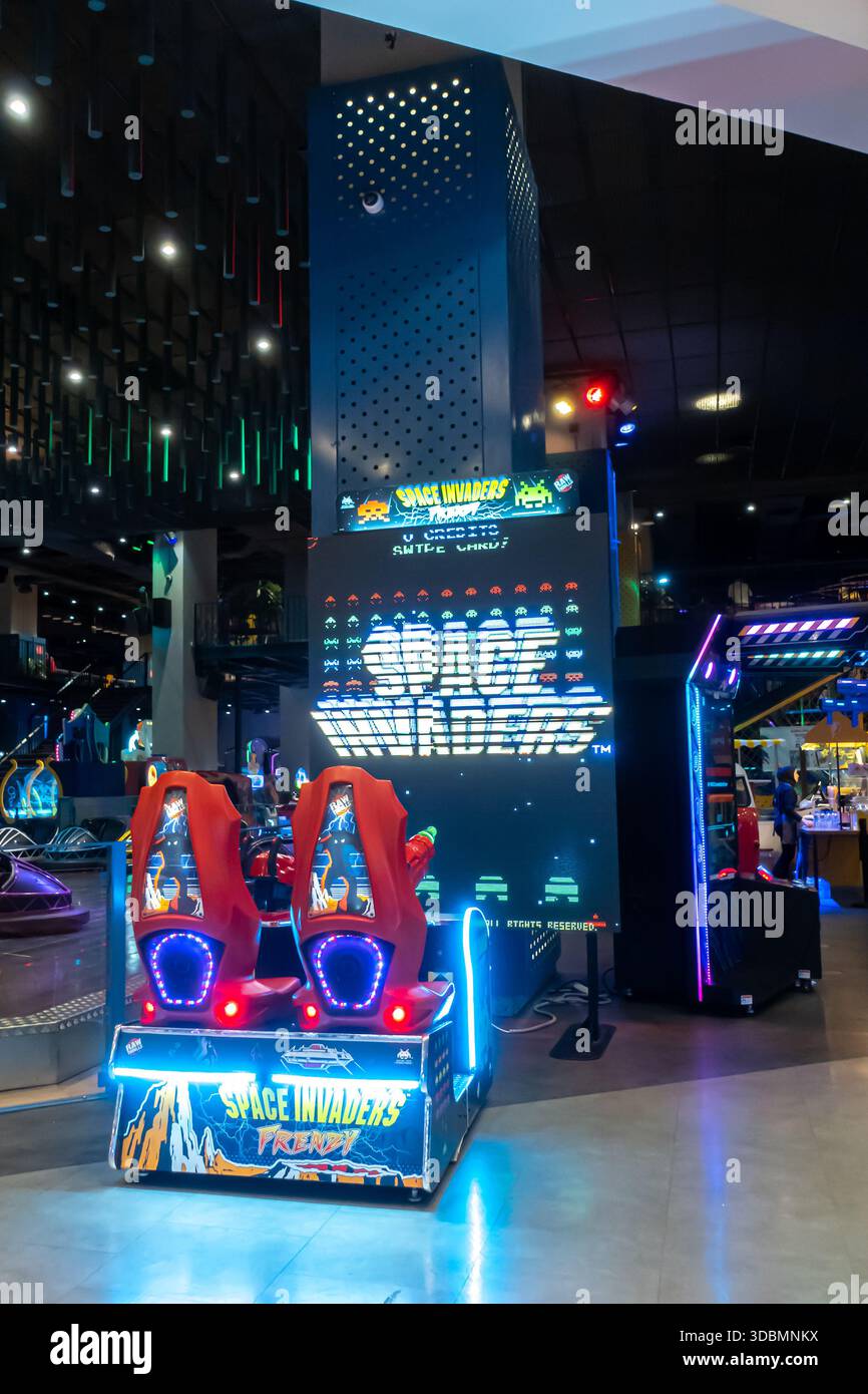 modern arcade game cabinet for the classic video game Space Invaders Frenzy. Istanbul Stock Photo