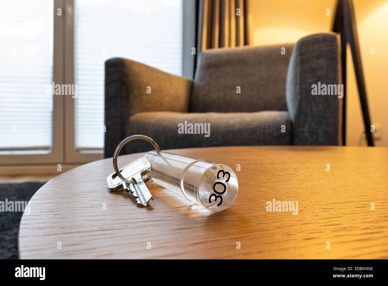 hotel or apartment key on table Stock Photo