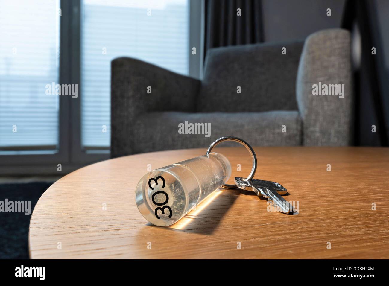 hotel or apartment key on table Stock Photo