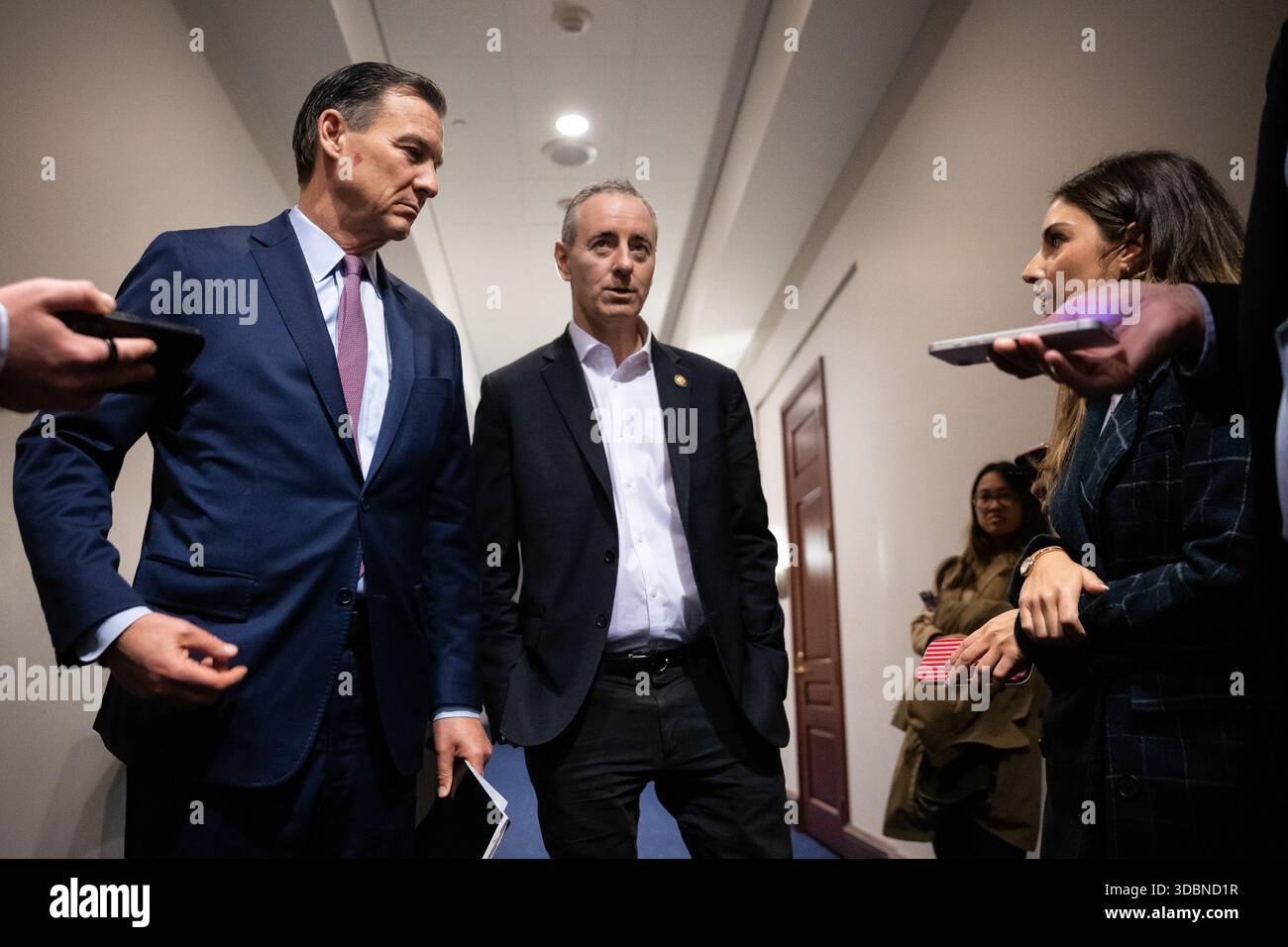 Reps. Tom Suozzi (D-N.Y.) and Brian Fitzpatrick (R-Pa.) speak with ...