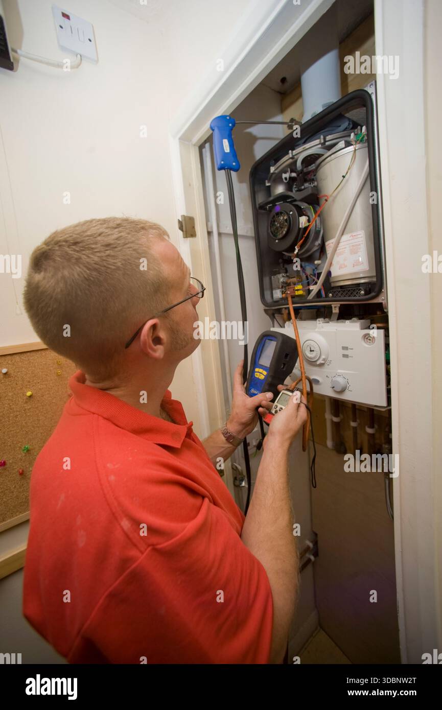 Boiler Checking Plumber inspecting boiler checking system hi-res stock photography and ...