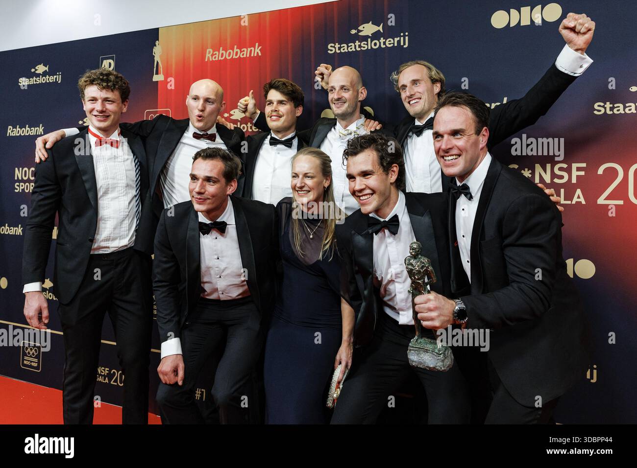ARNHEM - Members of the men's eight - Rowing pose with the award after ...