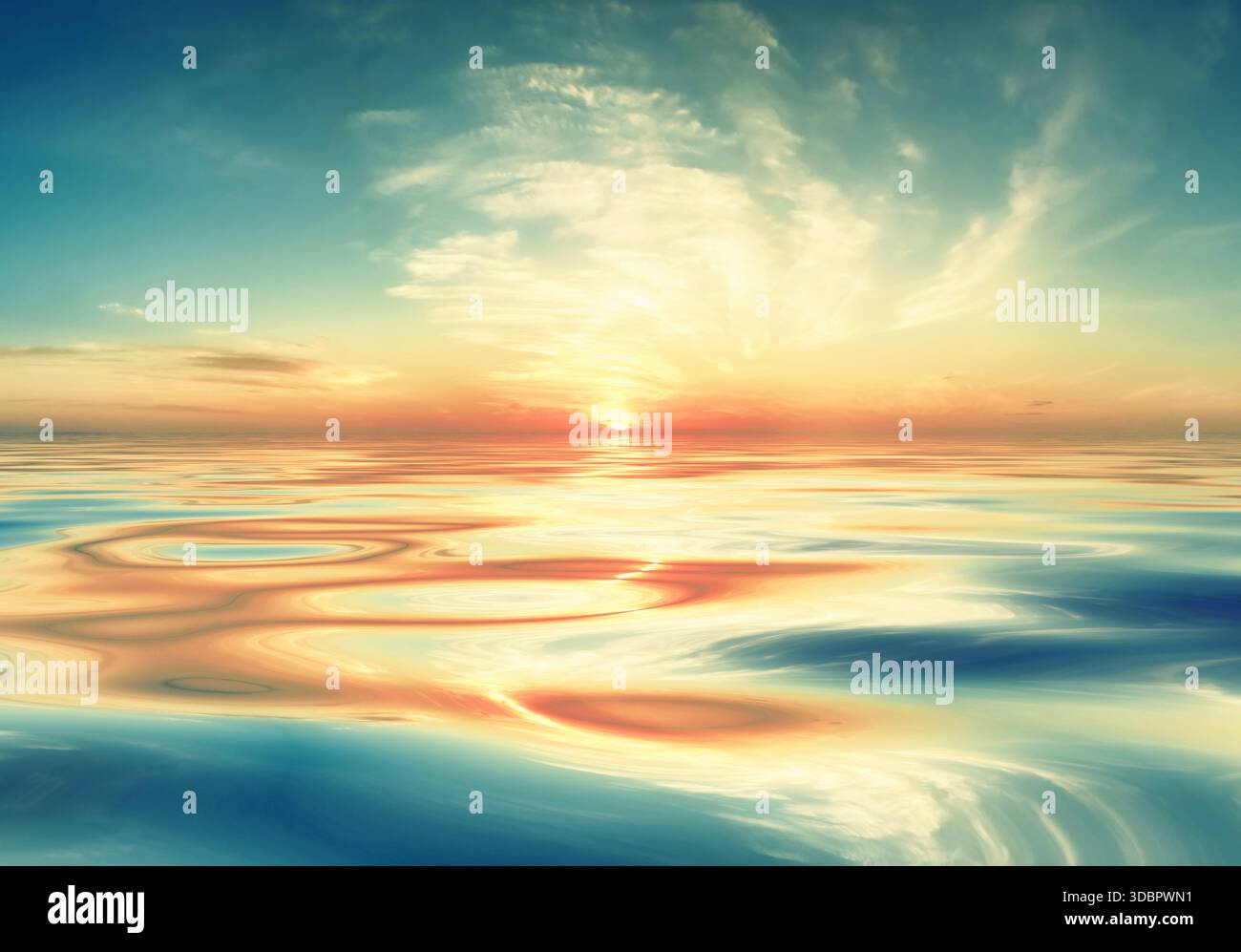A peaceful seascape at sunrise or sunset with rippling water reflecting a cloudy sky illuminated by brilliant colours, creating a tranquil atmosphere Stock Photo