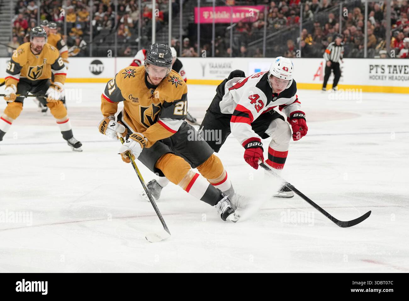 Vegas Golden Knights center Brett Howden (21) skates with the puck ...