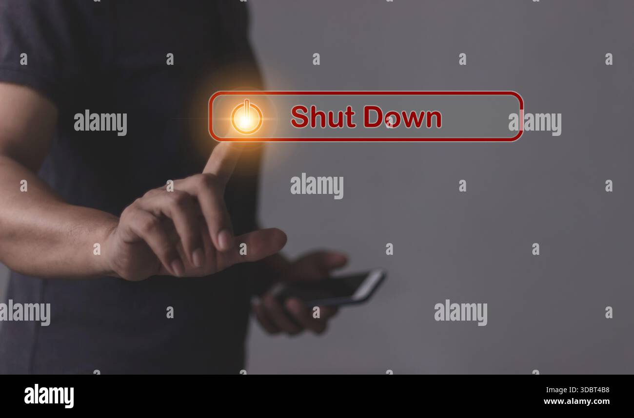 Young man with smartphone hand touching Shut Down button press power OFF Stock Photo