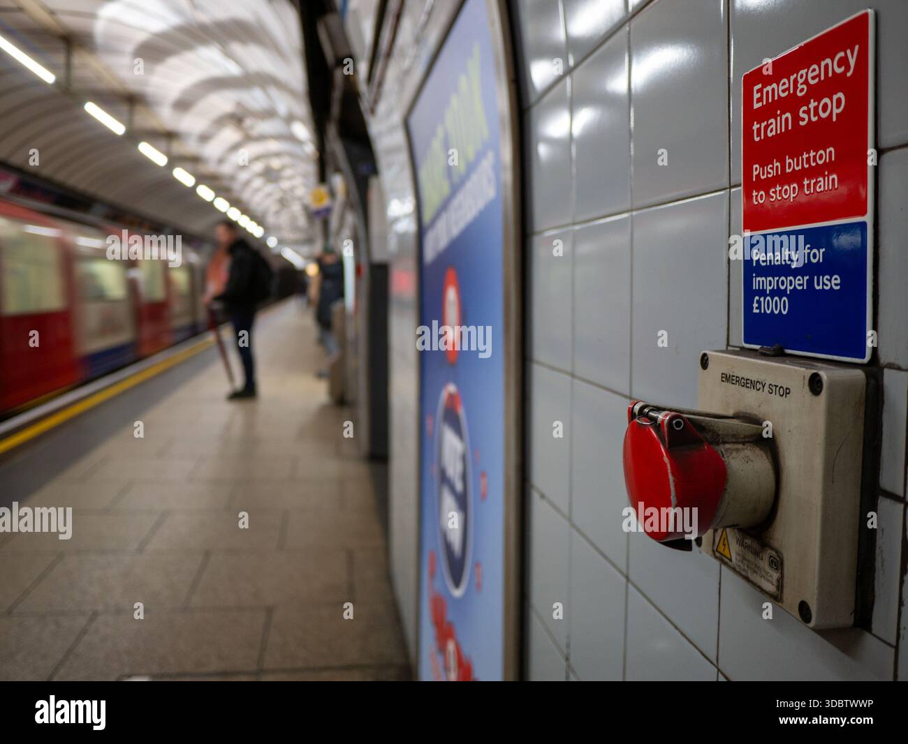 Underground Train Stop An emergency train stop button on a Transport for London (TfL) London ...
