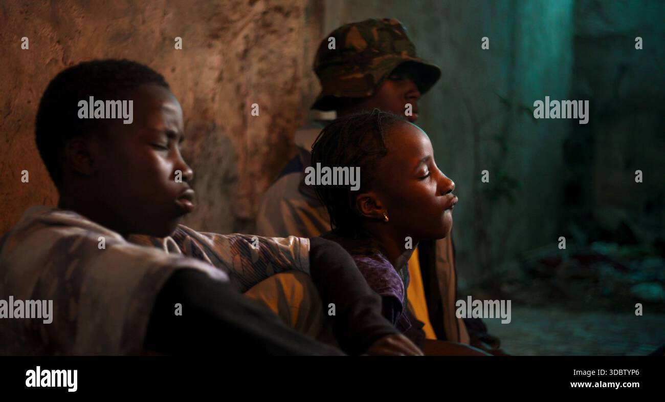 Timis (2023)Dusk (2023) Dammerung (2023) Cheikh Amadou Bamba Traoré,  Binta Traoré,  Djiby Camara *Filmstill - Editorial Use Only* see Special Instruc Stock Photo