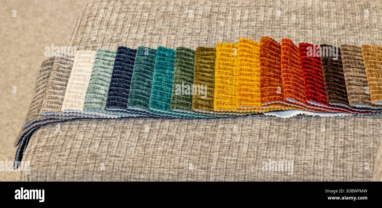 Colorful textile furniture upholstery samples in room interior Stock Photo
