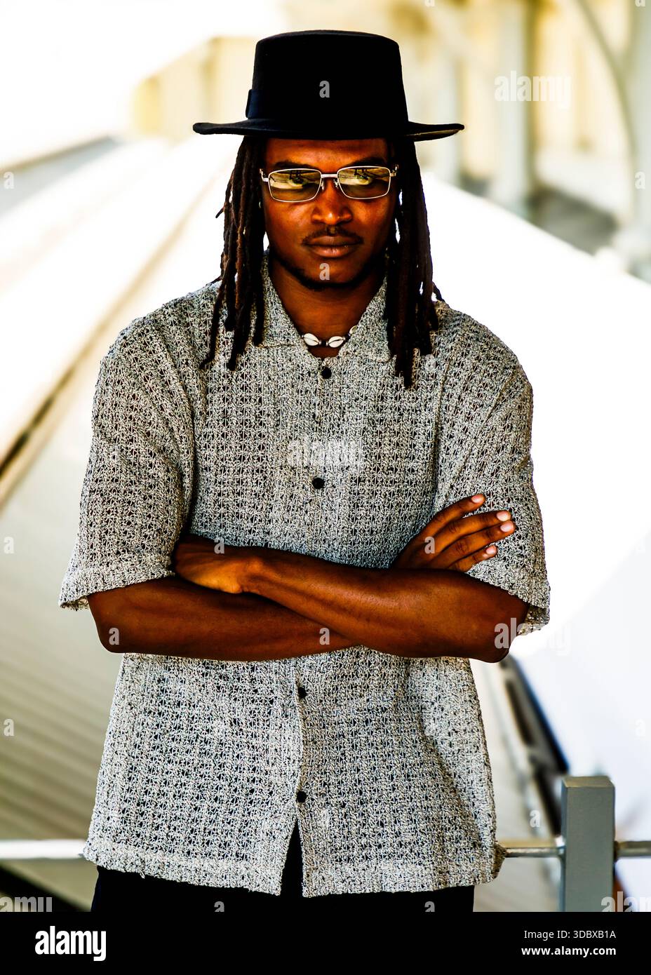 Man dark skin stands arms hi-res stock photography and images - Alamy