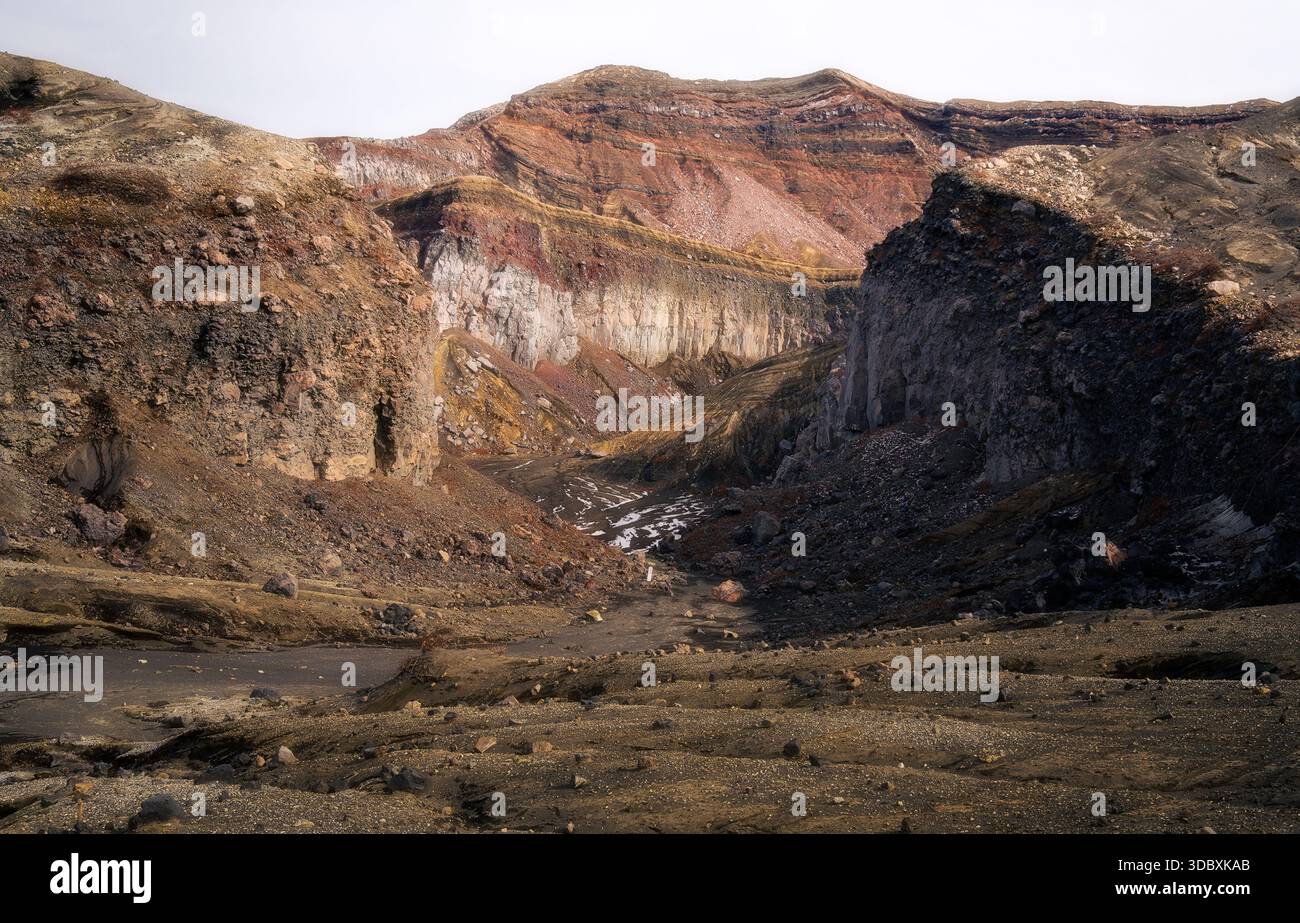 Terrain Diffused View of the rugged terrain, revealing layers of geological history in a ...