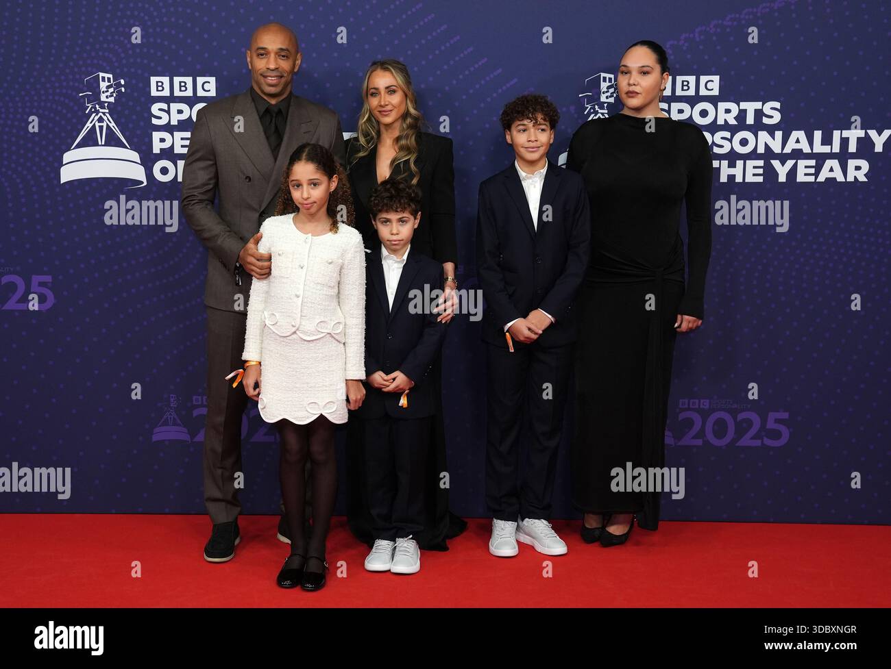 Thierry Henry, Andrea Rajacic and family arriving for the 2025 BBC Sports Personality of the Year Awards held at dock10 Studios at MediaCityUK, Salford. Picture date: Thursday December 18, 2025. Stock Photo