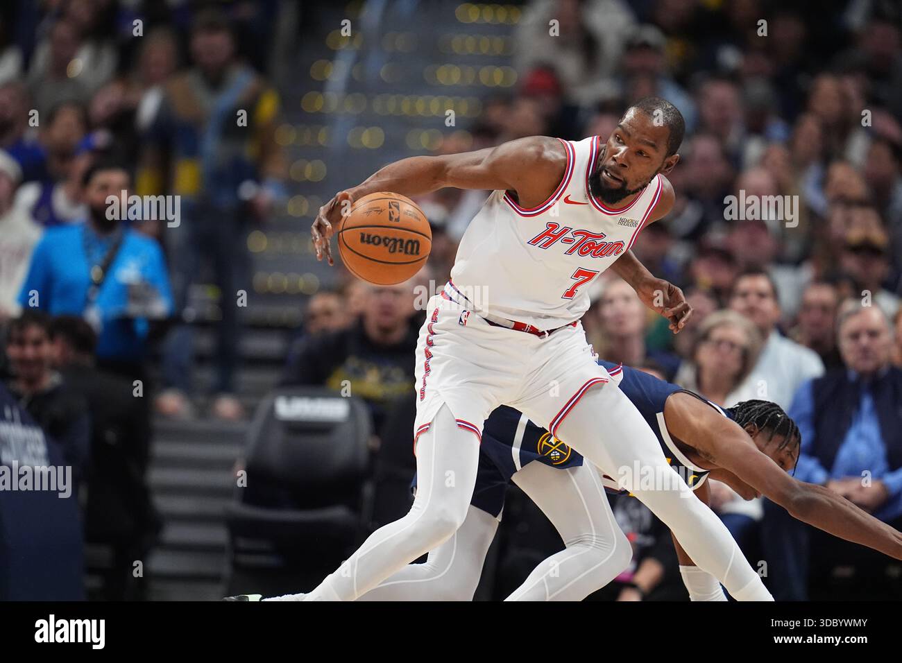 Houston Rockets forward Kevin Durant (7) and Denver Nuggets guard ...