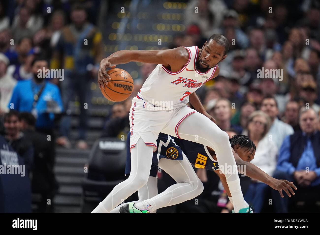 Houston Rockets forward Kevin Durant (7) and Denver Nuggets guard ...