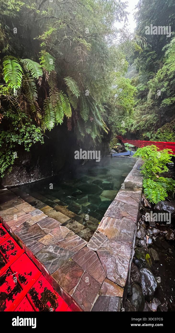 Thermal Geométricas hot springs, featuring iconic red wooden walkways ...