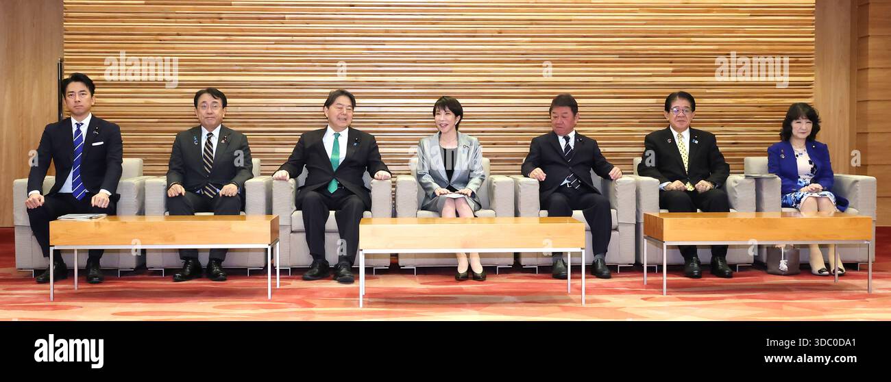 Japanese Prime Minister Sanae Takaichi (C) attends a cabinet meeting at ...