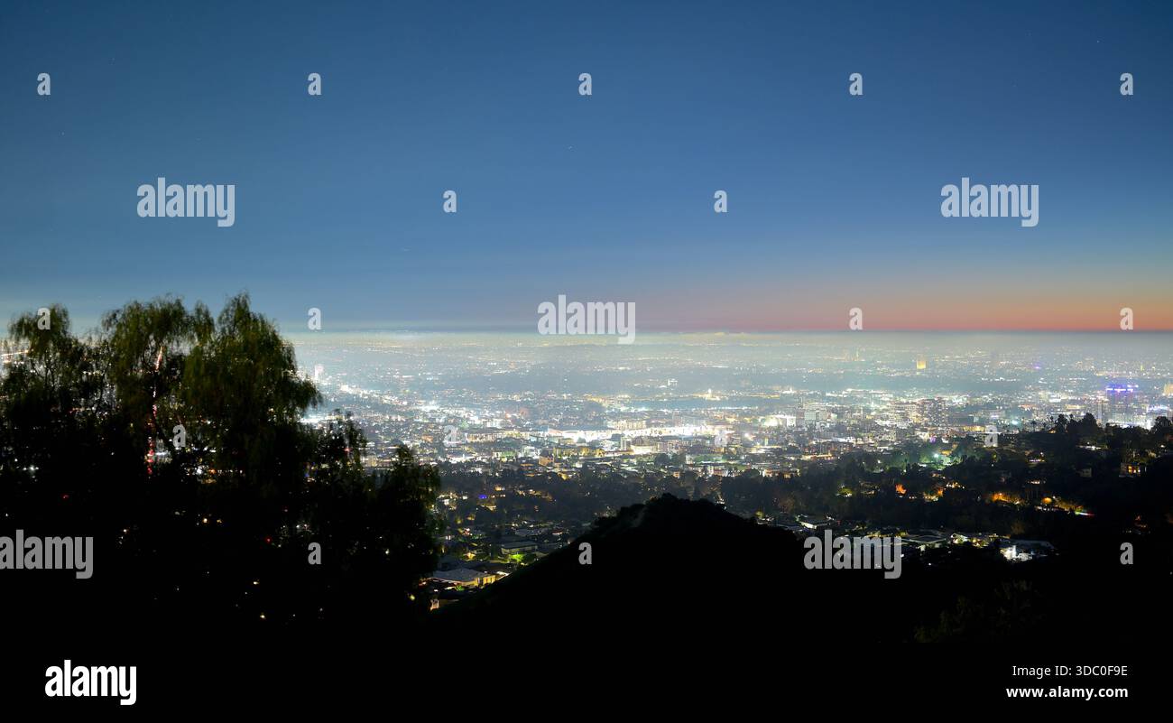An evening at the iconic Griffith Observatory overlooking the megacity ...