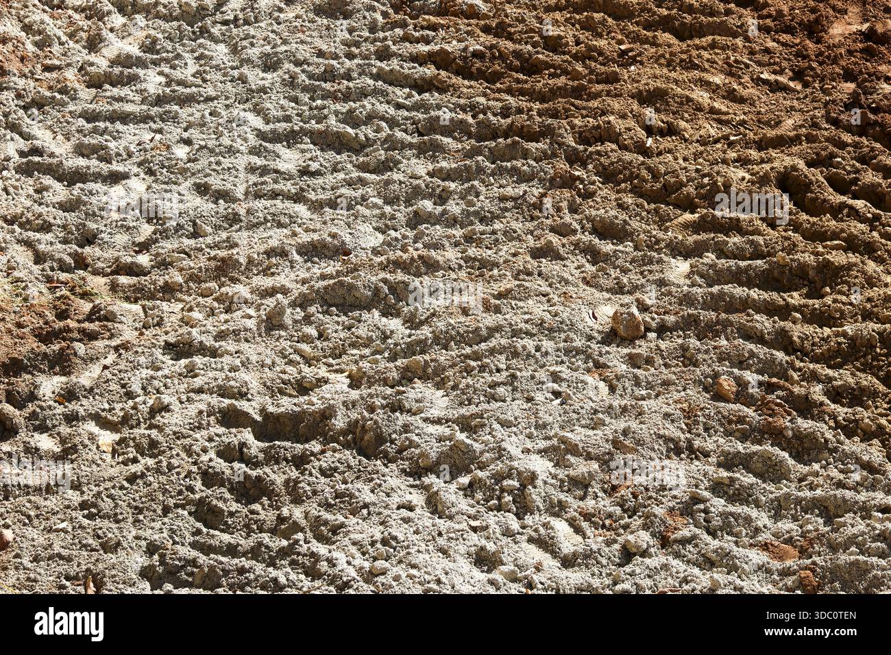 Soil Rough Texture Rough textured soil surface with deep tire track imprint on uneven ...