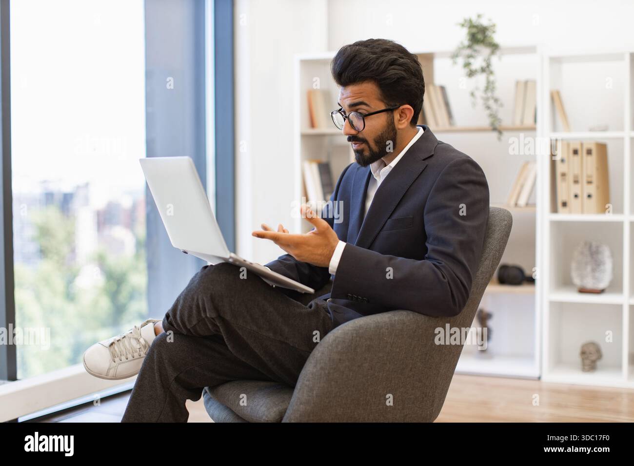 Arabian Businessman on Video Call Stock Photo