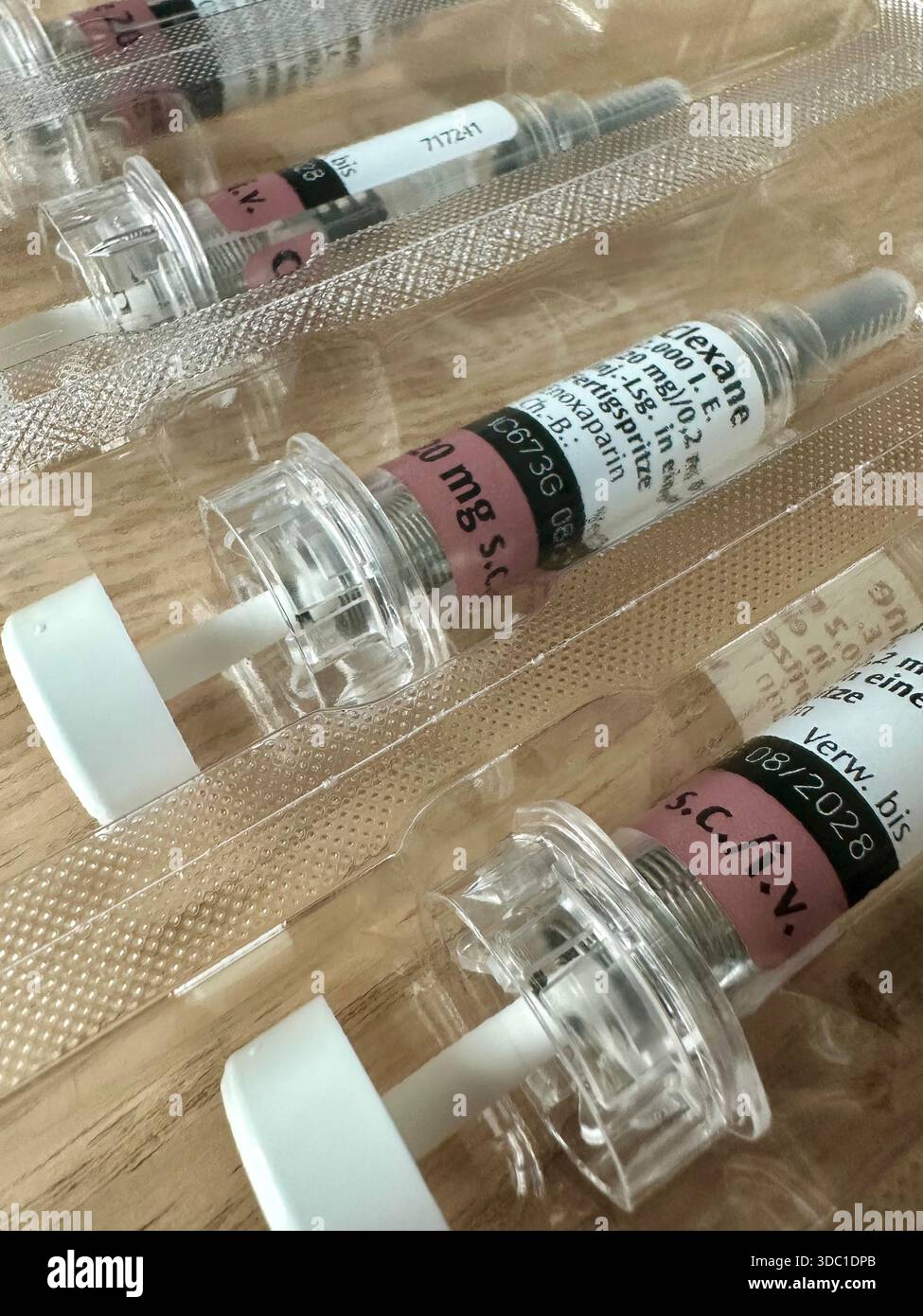 Clexane pre-filled hypodermic of enoxaparin sodium with Eris needle safety guard - Smartphone Captured Stock Image