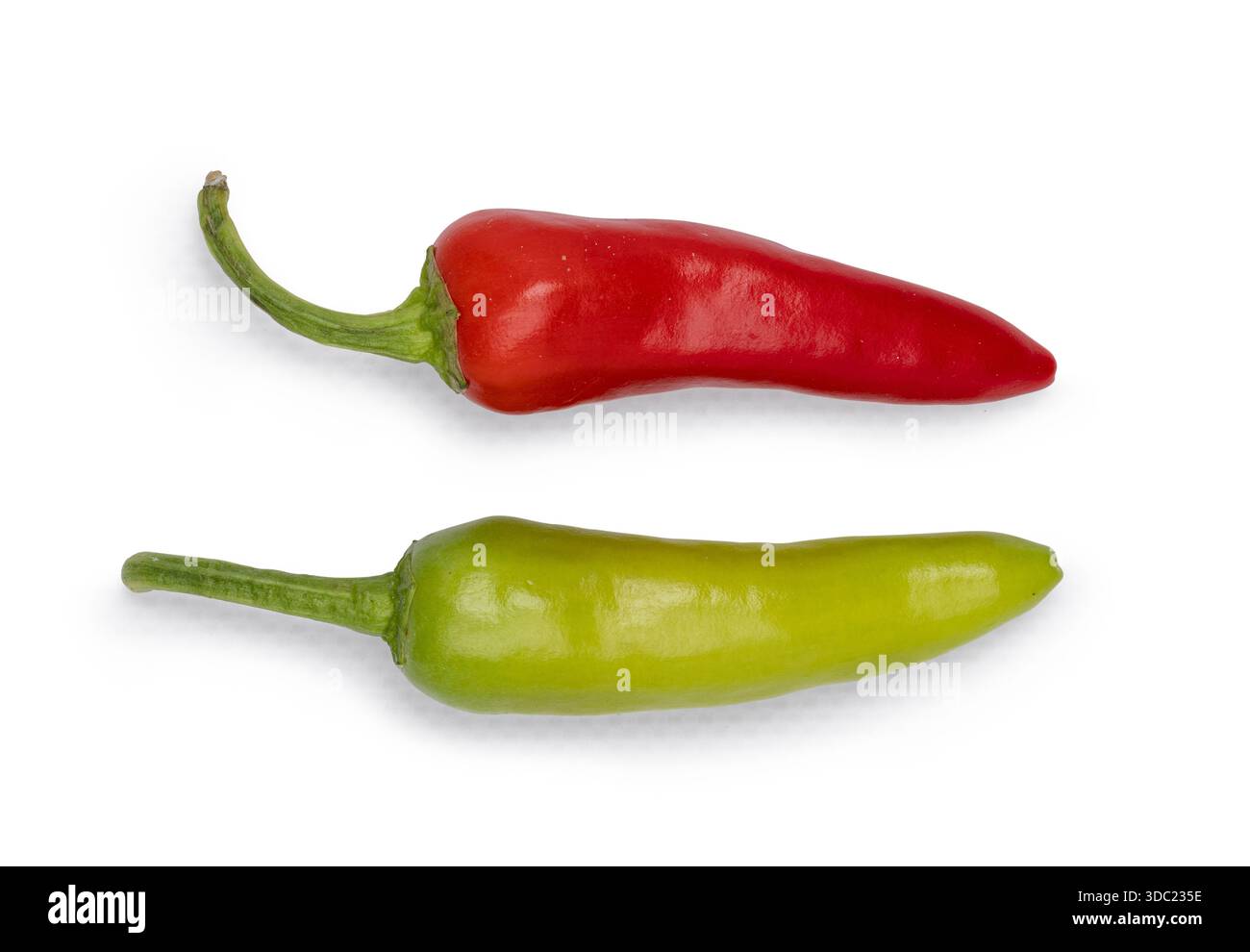Chili peppers providing spicy hot flavor in food and cuisine. Isolated on a white background. Stock Photo