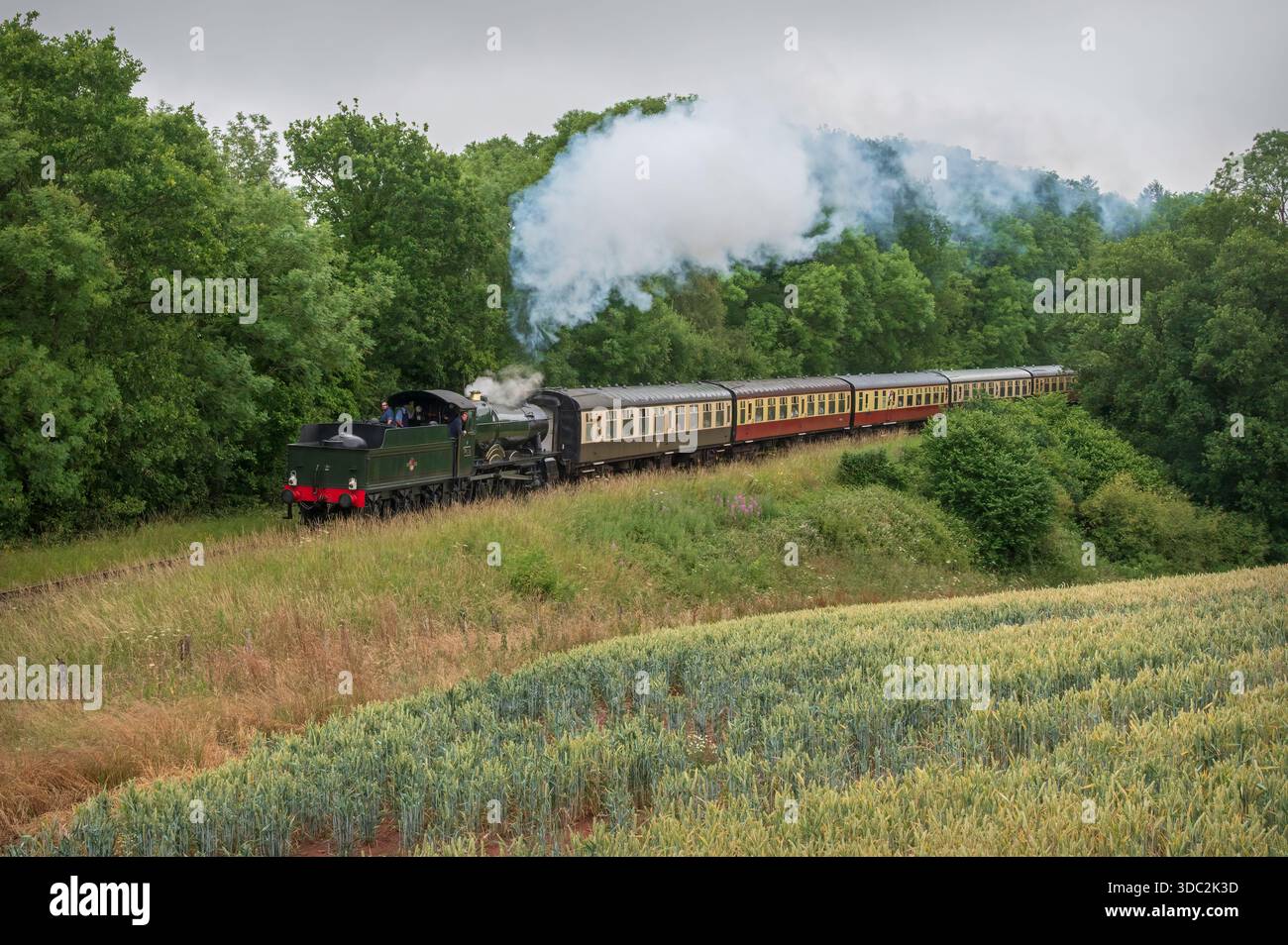 Steam locomotive 7812, Erlestoke Manor, pulling a passenger train on ...