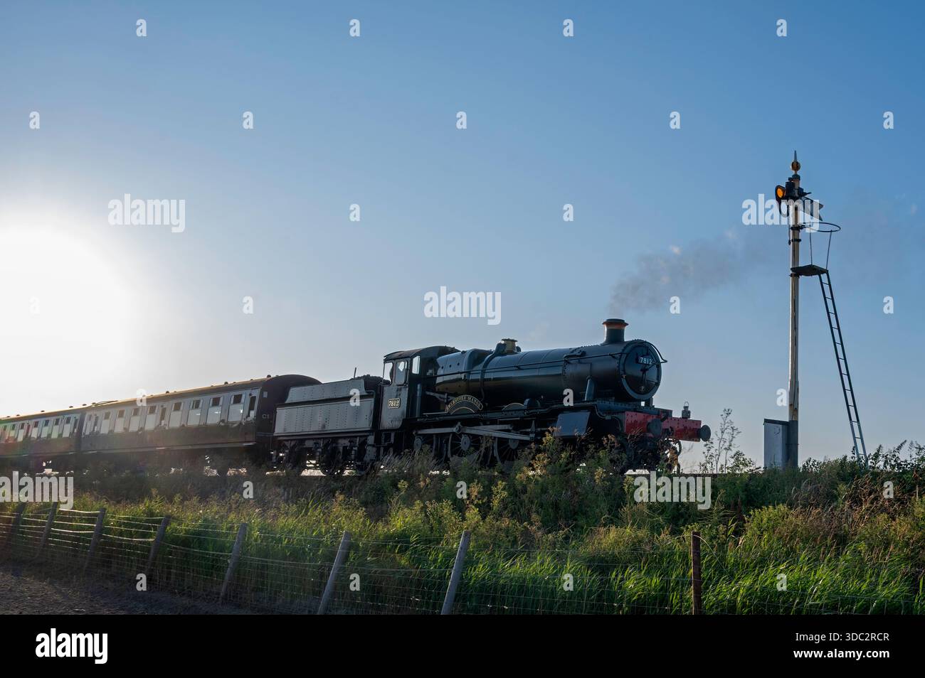 Steam locomotive 7812, Erlestoke Manor, pulling a passenger train on ...