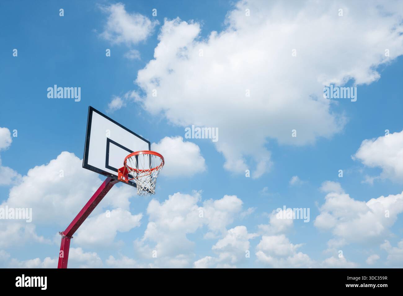 Basketball basket on blue sky background Stock Photo