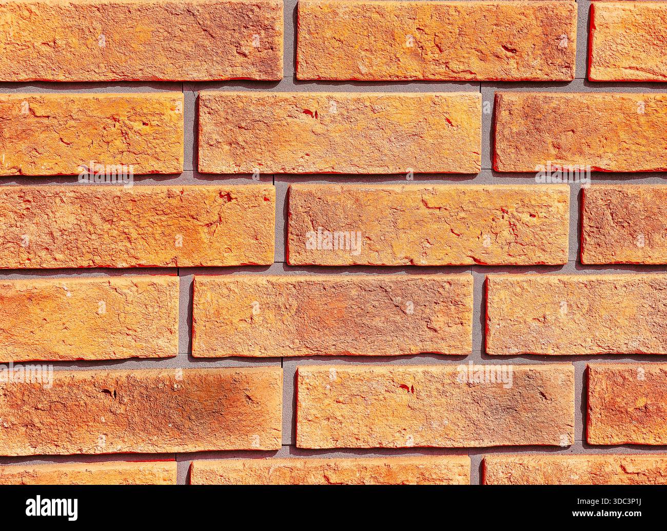 Orange Brick Wall Texture with Rectangular Pattern for Modern Architectural and Construction Design Copy Space Background Stock Photo