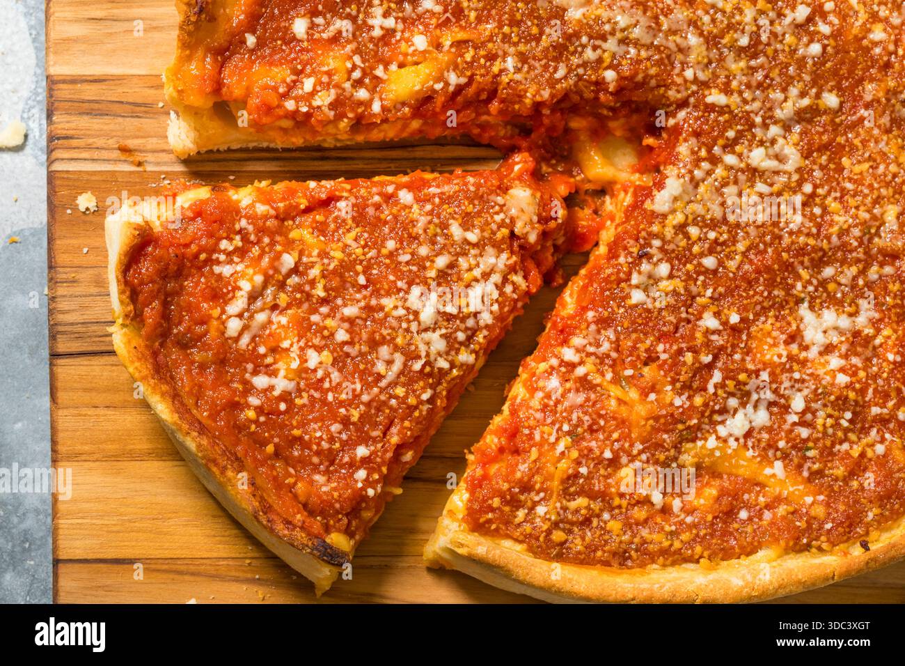 Homemade Chicago Style Deep Dish Pizza with Sauce and Cheese Stock Photo