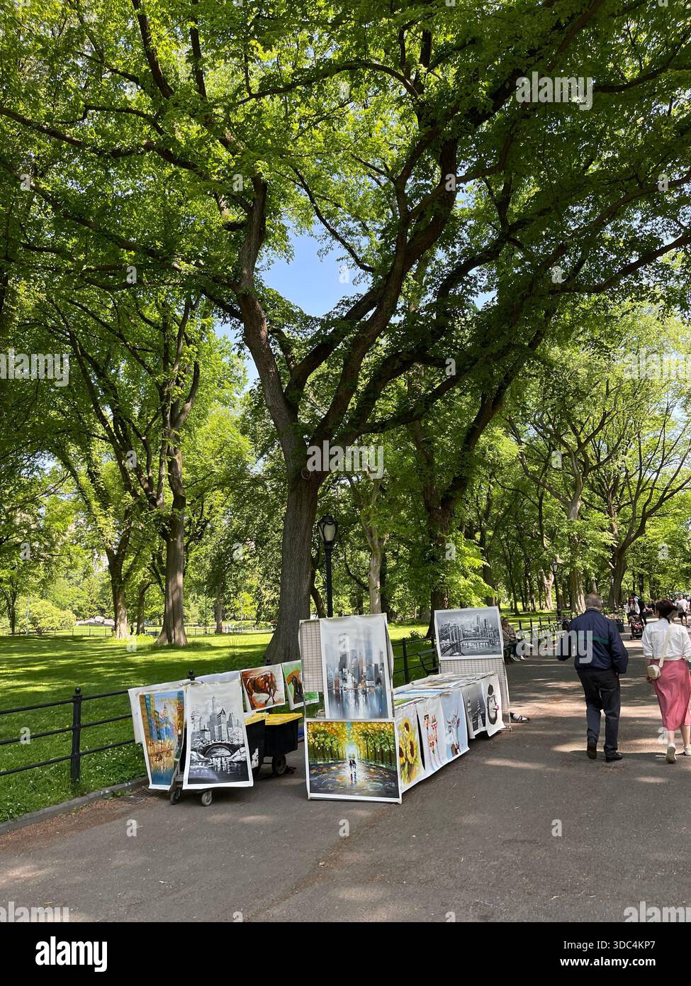 Everyday life in Manhattan, where urban energy meets pockets of green and calm. - Smartphone Captured Stock Image