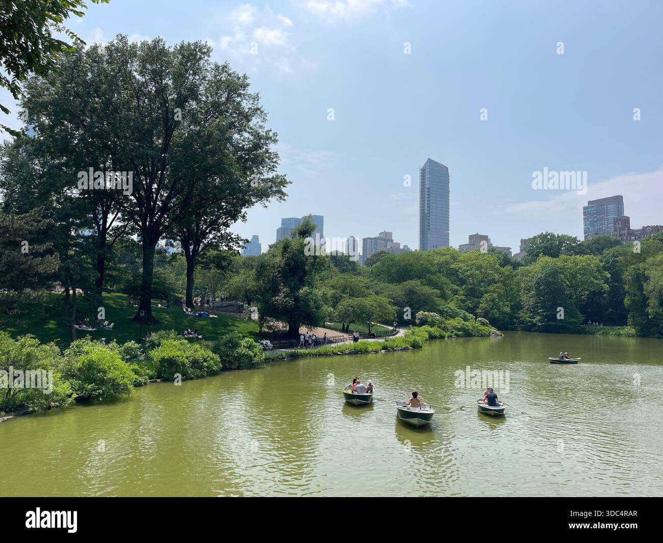 Everyday life in Manhattan, where urban energy meets pockets of green and calm. - Smartphone Captured Stock Image