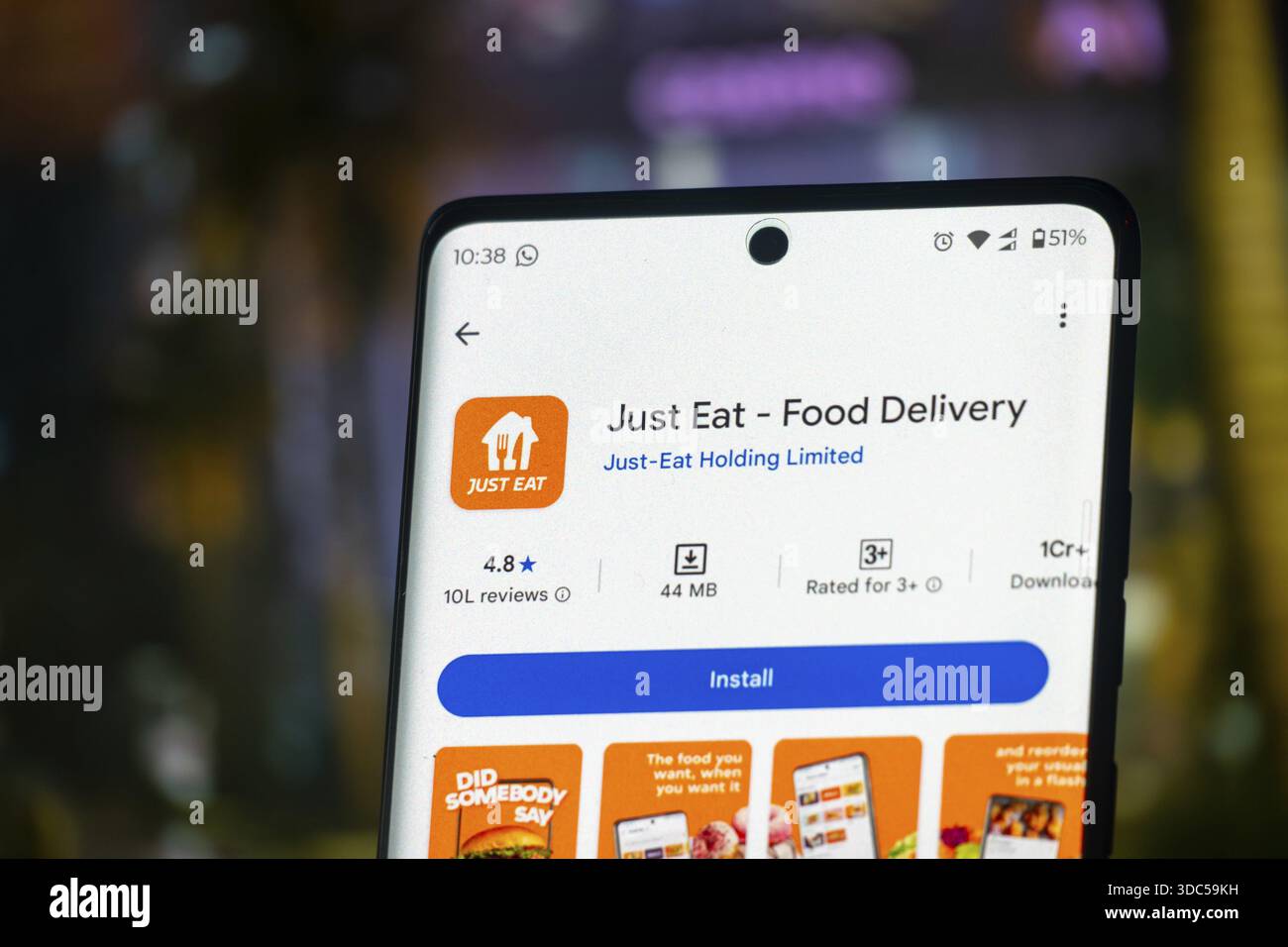 Just Eat food delivery app interface shown on a smartphone with an ...