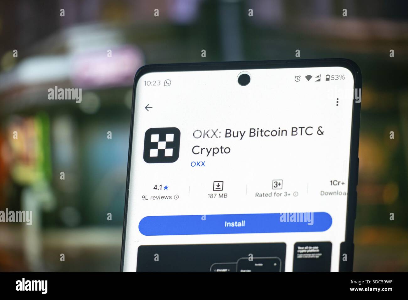 OKX app installation screen on a smartphone, highlighting services for  buying Bitcoin and other cryptocurrencies. Neon green background. Stafford,  Uni Stock Photo - Alamy