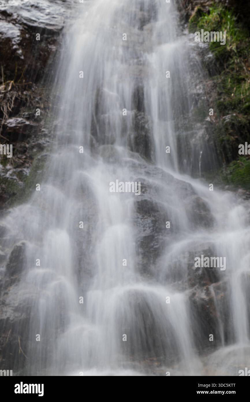 smooth flow of waterfall using long exposure Stock Photo