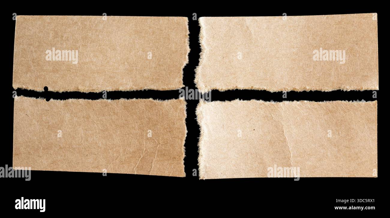 Torn papers on black background Stock Photo