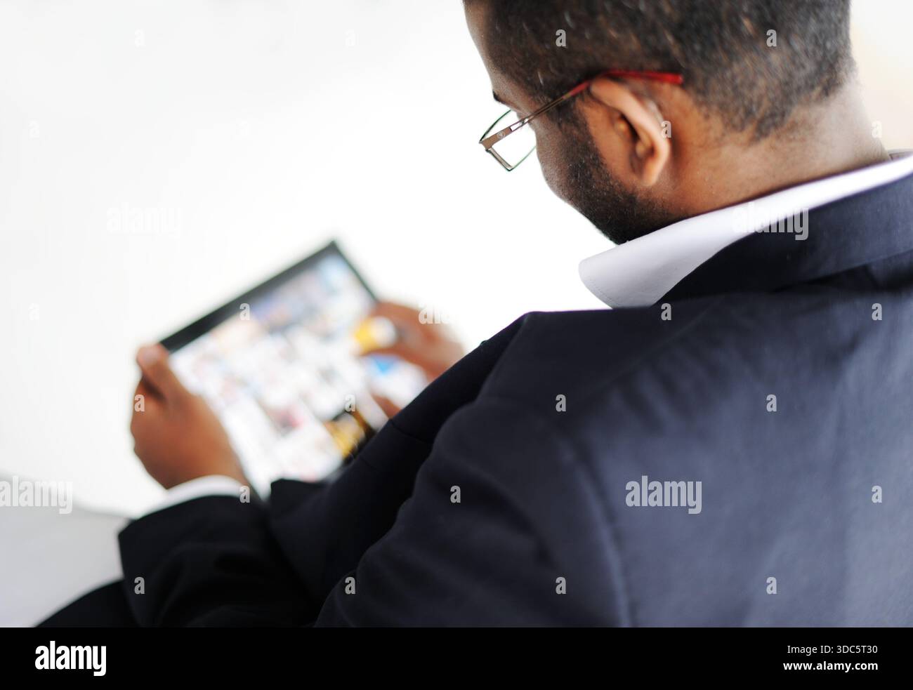 Handsome African American man with tablet computer Stock Photo