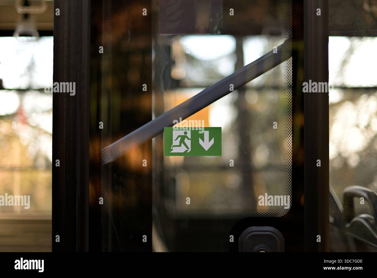Emergency exit sign on a bus window with blurred background Stock Photo ...