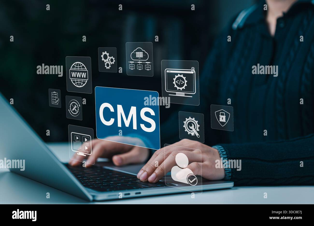 Woman working on laptop with CMS - Content Management System interface icons, representing website management, coding, cloud technology, workflow tool Stock Photo