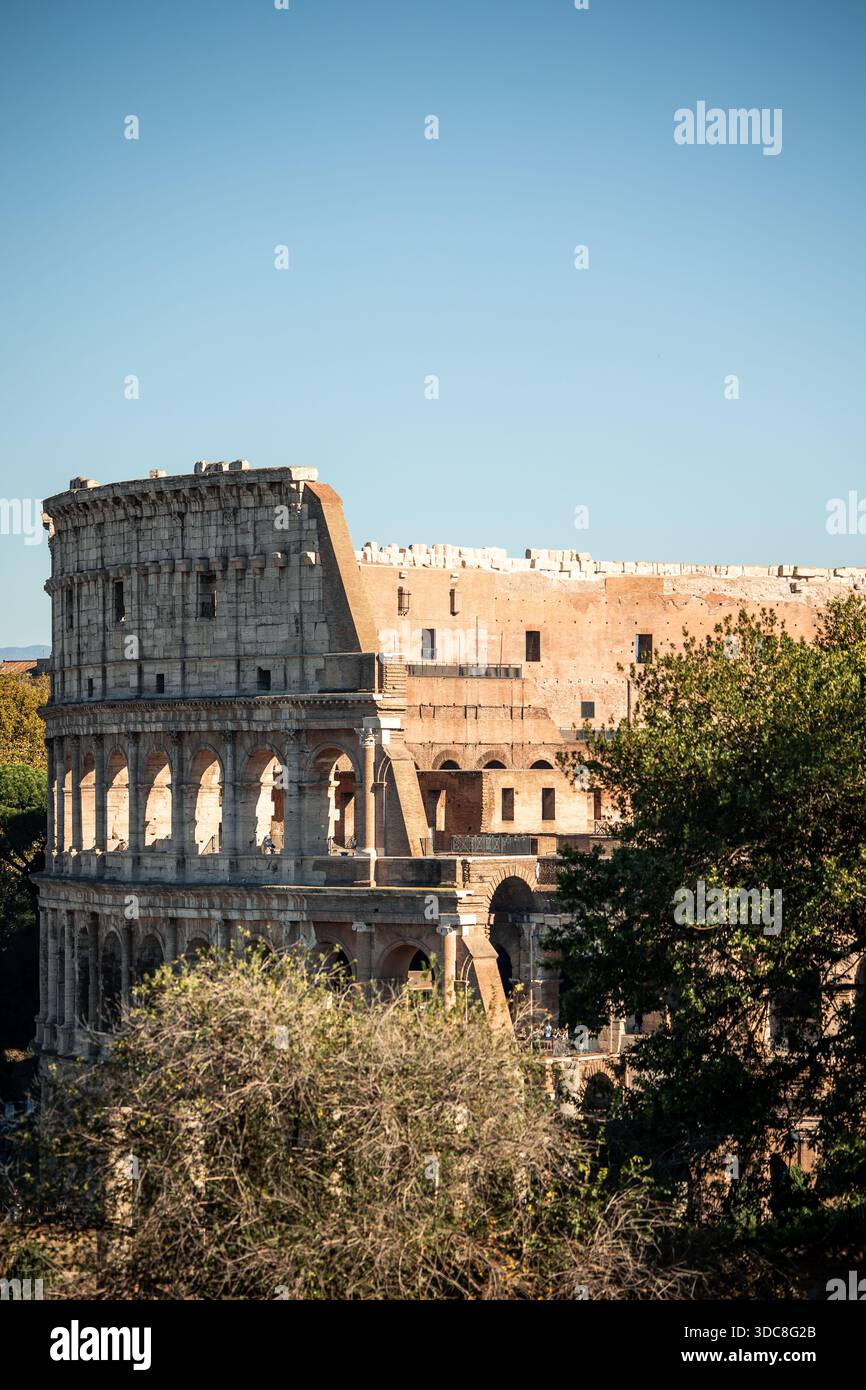 Ancient Roman Colosseum structure standing under a clear blue sky ...