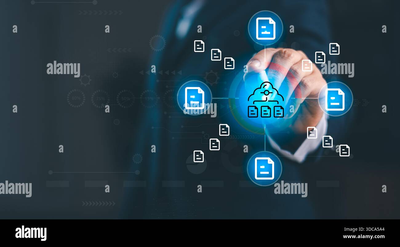 Business professional selecting cloud storage icon with multiple digital file symbols, representing online data management, secure cloud backup, file Stock Photo