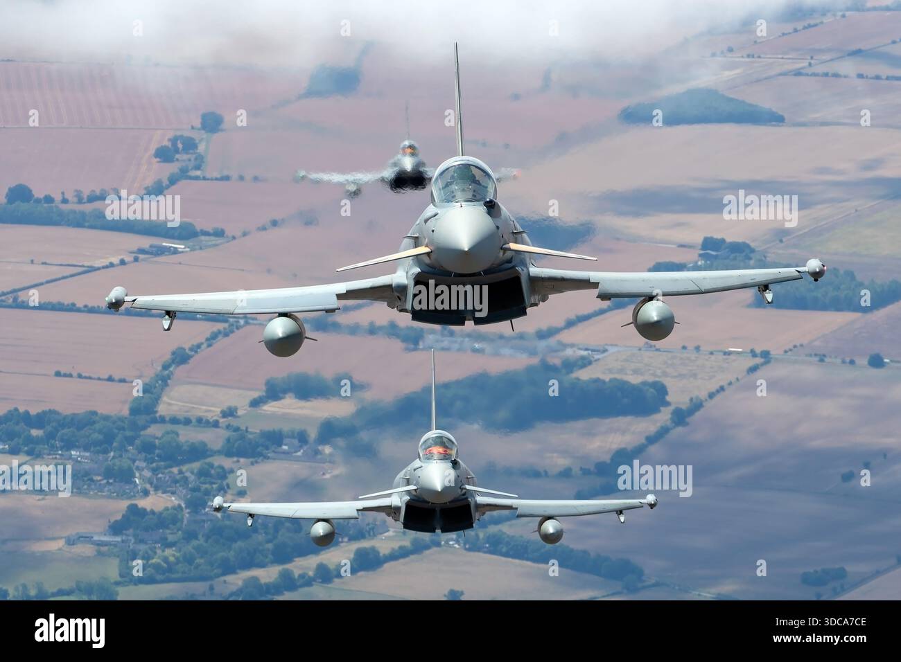 Typhoon Jet Rear Two Eurofighter EF-2000 Typhoon FGR4 aircraft are photographed flying ...
