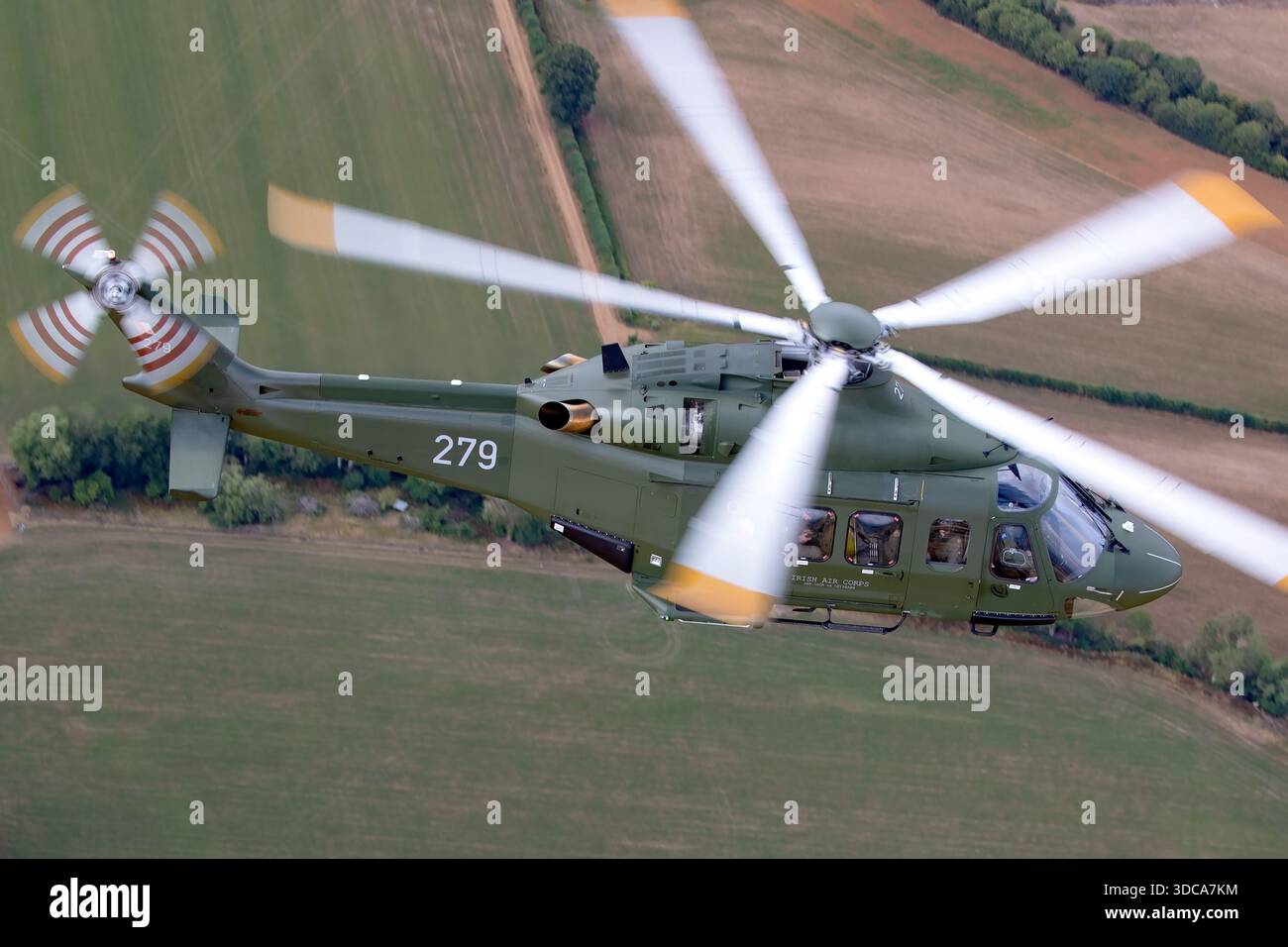 An air-to-air image shows an Irish Air Corps AugustaWestland AW-139 ...
