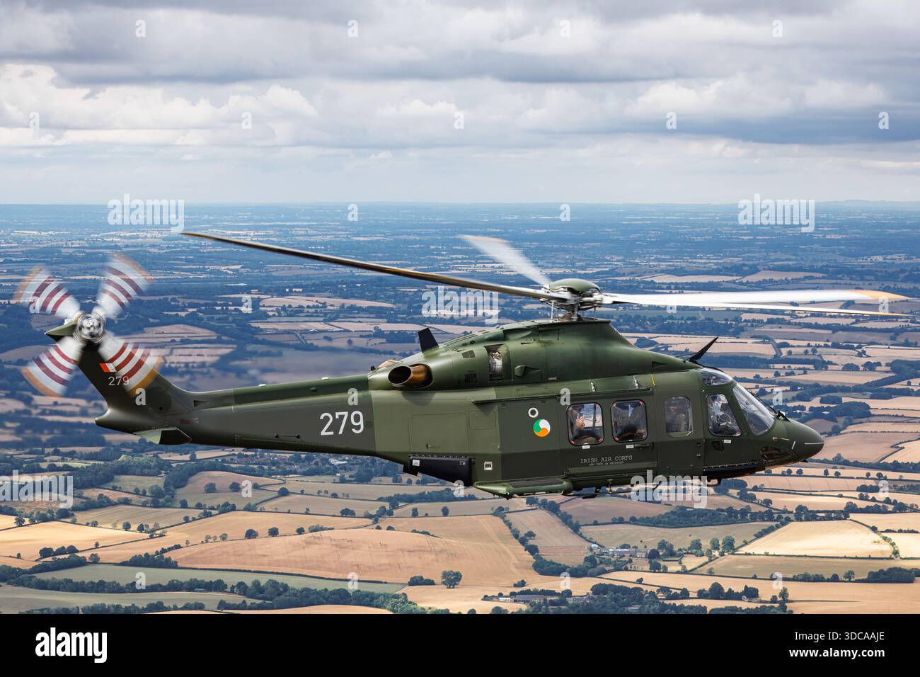 An air-to-air image shows an Irish Air Corps AugustaWestland AW-139 ...
