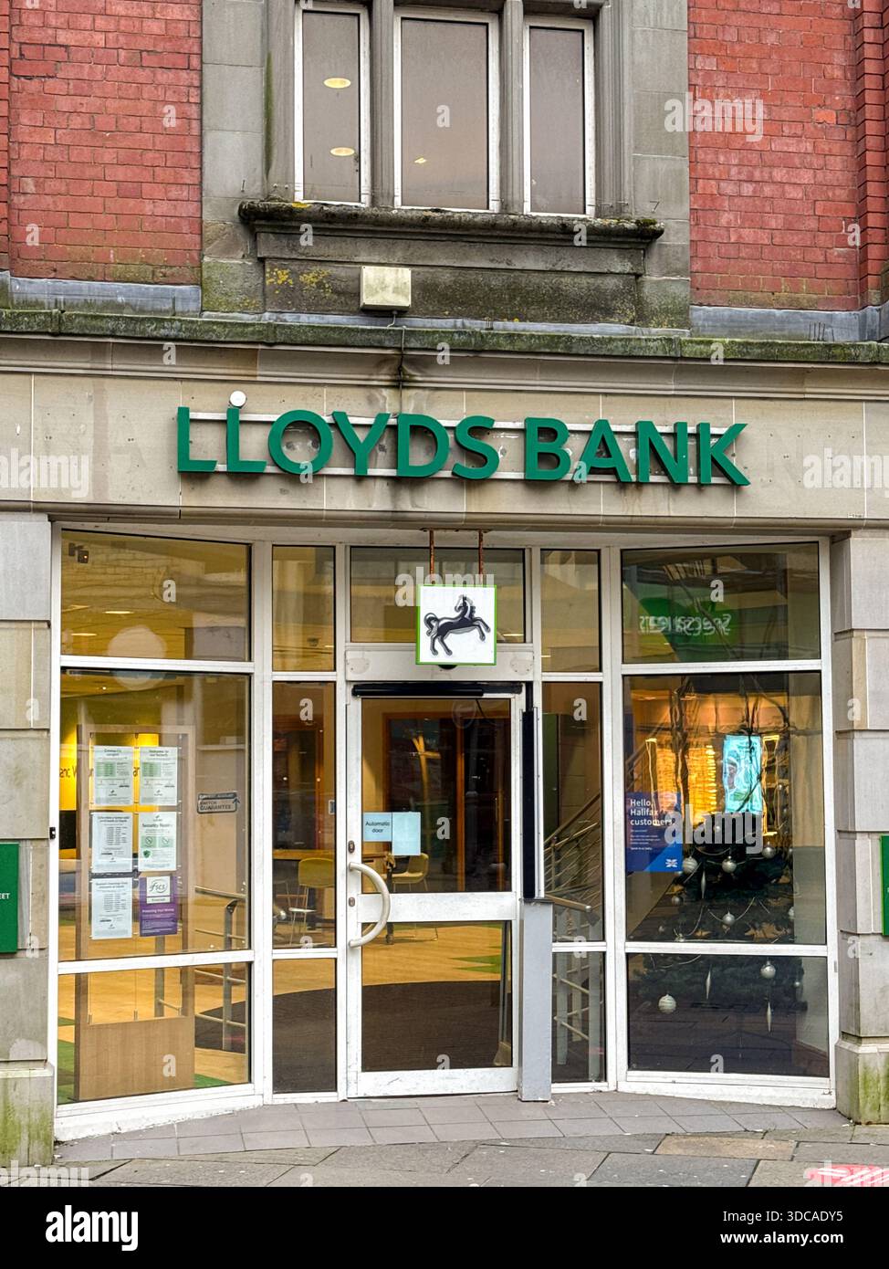 Bridgend, Wales, UK - 14 December 2025: Front exterior view of the branch of Lloyds Bank in Bridgend town centre. - Smartphone Captured Stock Image