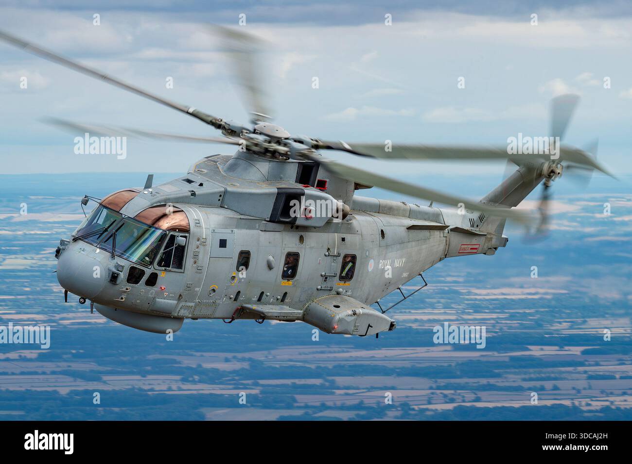 EH101 Merlin HM2 ZH832 of the Royal Navy is captured in air-to-air ...