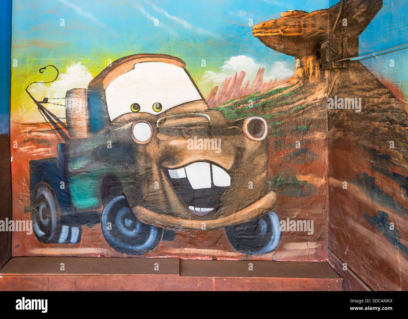 On ROUTE 66, mural of cartoon character Sir Tow Mater from the