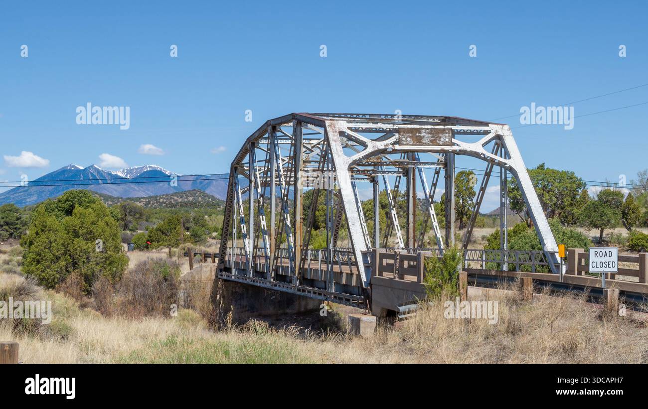 On ROUTE 66, Walnut Canyon Bridge, Mt. Taylor in background, near Winona, Arizona. National Register of Historic Places Stock Photo